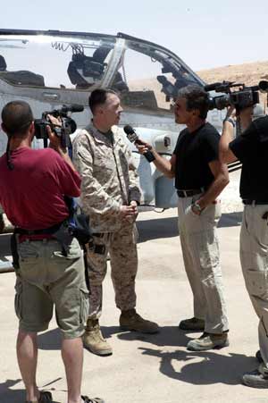 Fox News Channel’s senior war correspondent, Geraldo Rivera (center right), conducts an interview with Maj. Gen. Keith J. Stalder, commanding general, 3rd Marine Aircraft Wing, aboard the air base at Al Asad, Iraq, June 25. During his two-day visit to the Marines of 3rd MAW, the 61-year-old New York City native received a firsthand view of various 3rd MAW assets and warfighting capabilities.  Photo by: Staff Sgt. Houston F. White Jr.